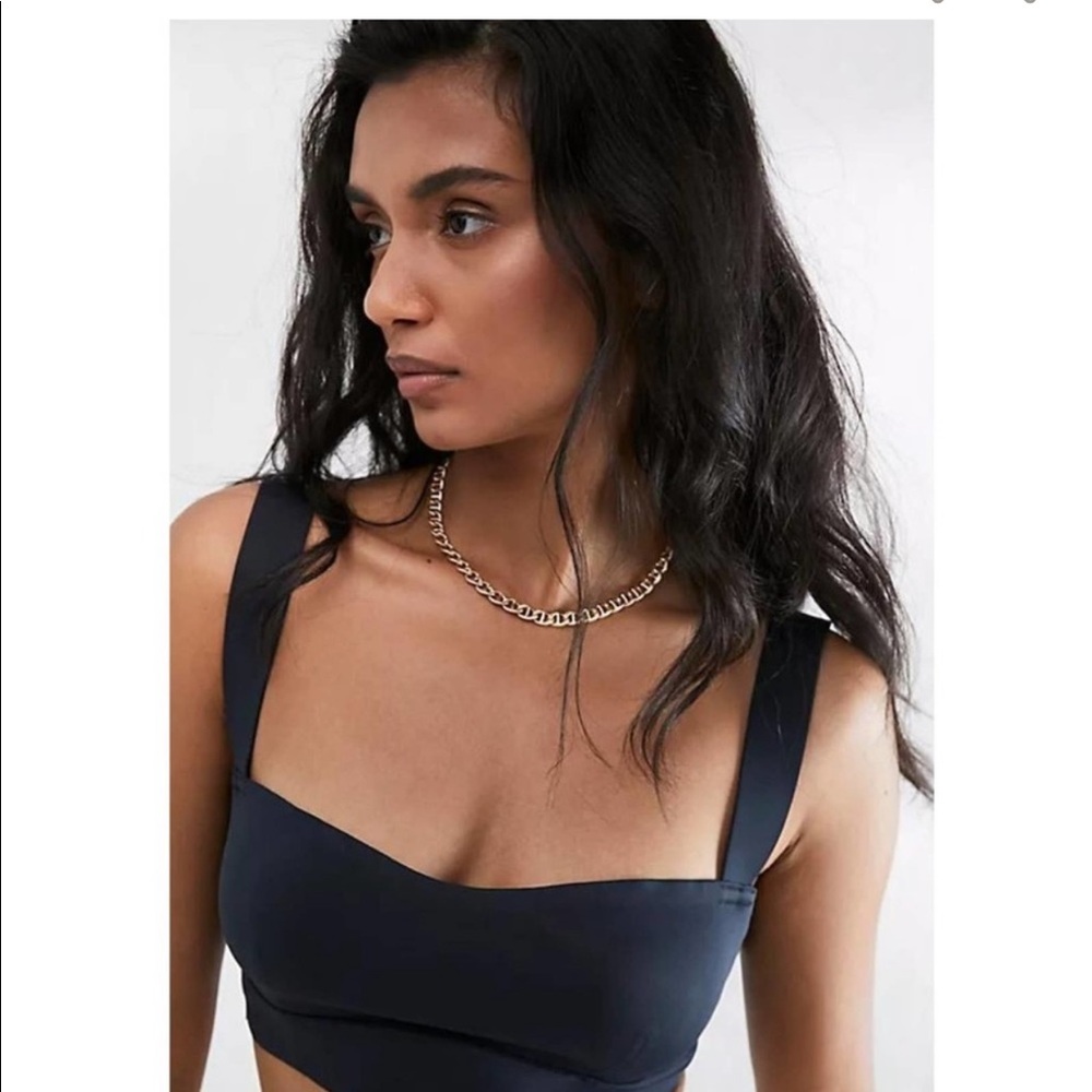 FREE PEOPLE NAVY BLUE BRA IN MEDIUM. NEVER WORN  NO PADDING AND VERY SOFT MATERI